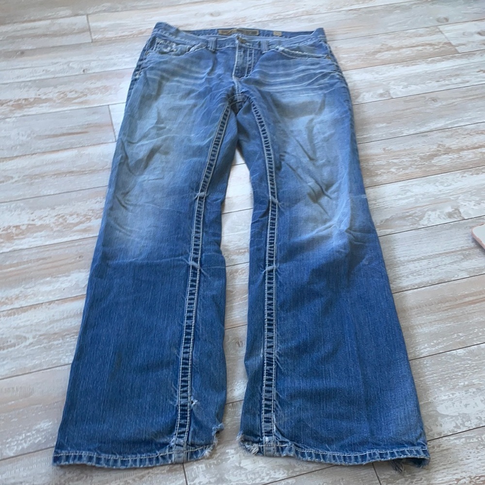 Men’s buckle jeans